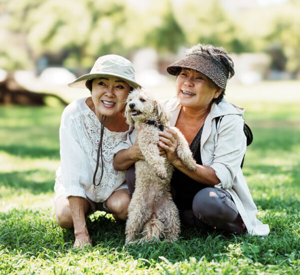 Photo of two ladies and their dog