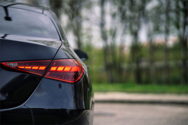 Image of the taillights of a sedan