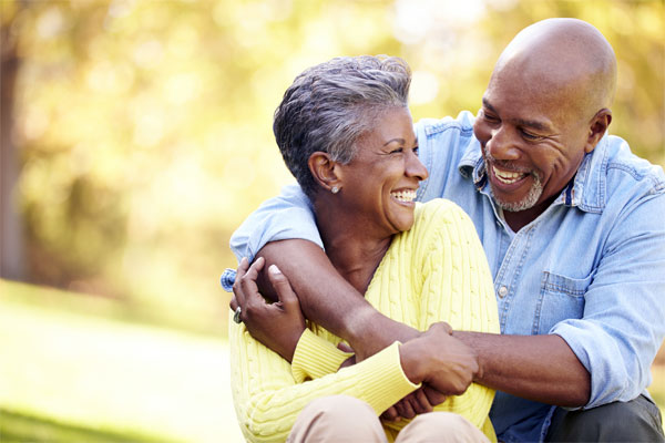 Image of a happy older couple embracing