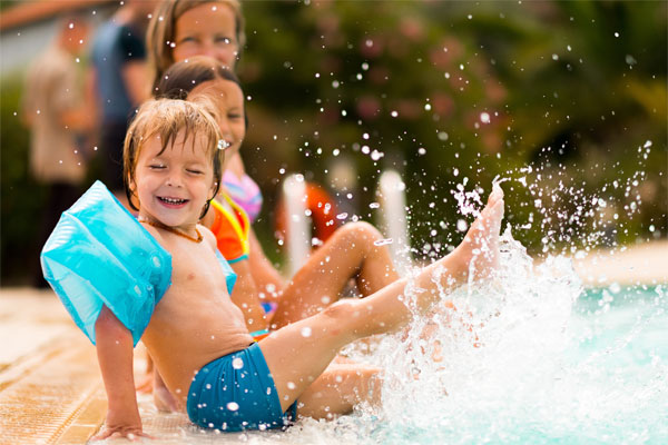 Image of children playing in the pool